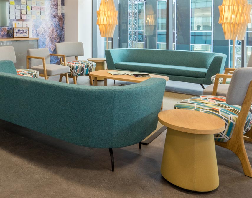 Low curved sofas in office space