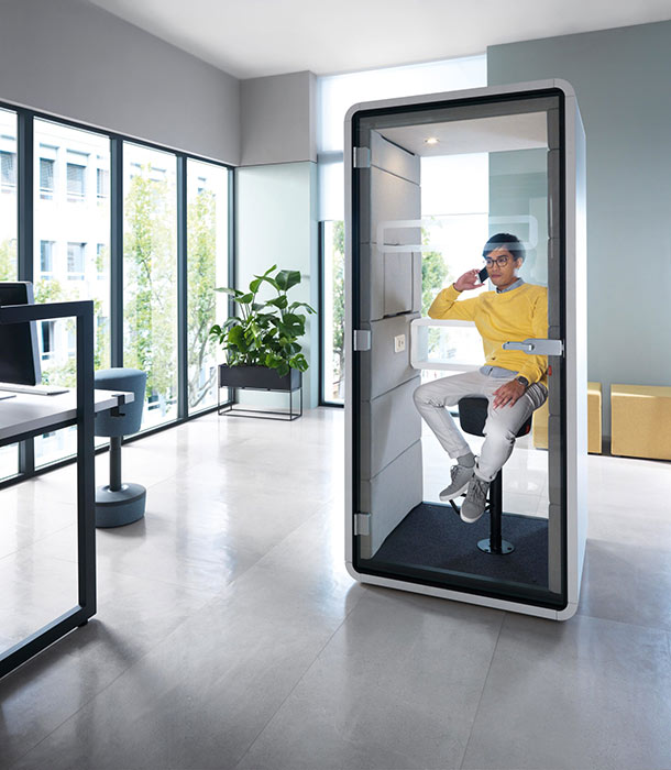 Hush phone pod with hocker stool.
