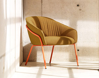 Armchair with exposed wood frame