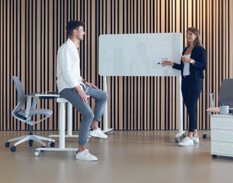 Mobile filp table with battery powered height adjustment and writable tabletop.